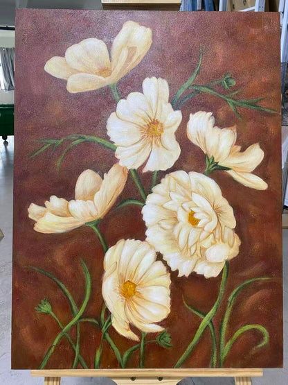 Cream cosmos flowers against vintage brown background
